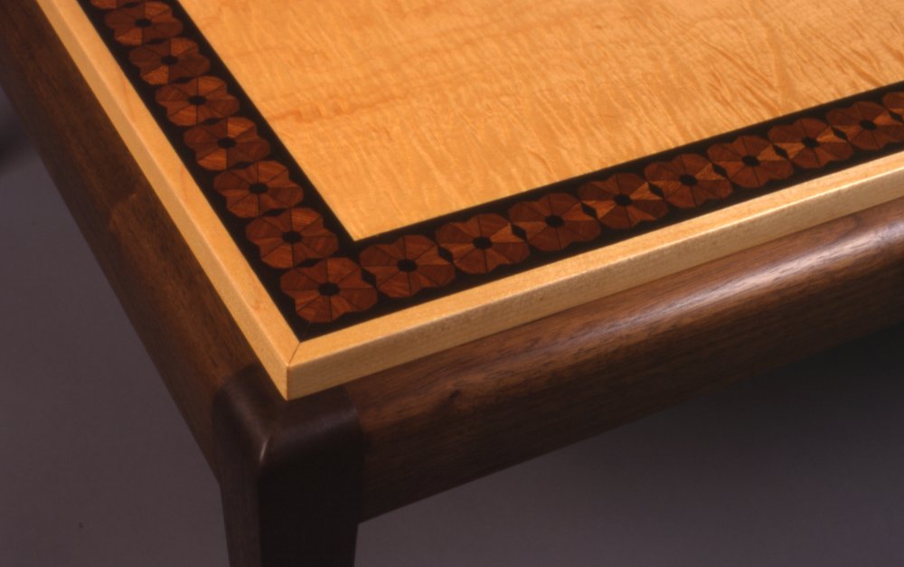 Coffee Table Detail: walnut, maple, curly maple veneer, antique banding.