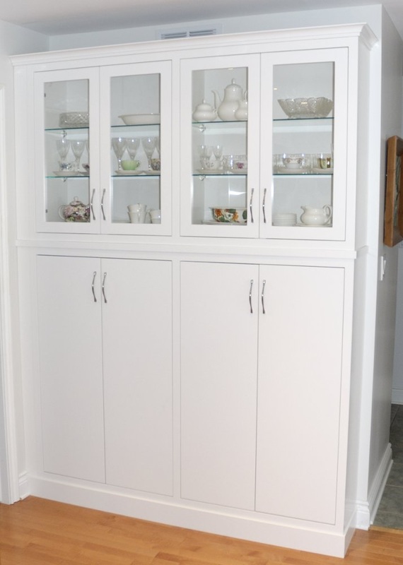 Contemporary White Kitchen; pantry and china cabinet: face frame construction, slab doors and glazed doors, paint.