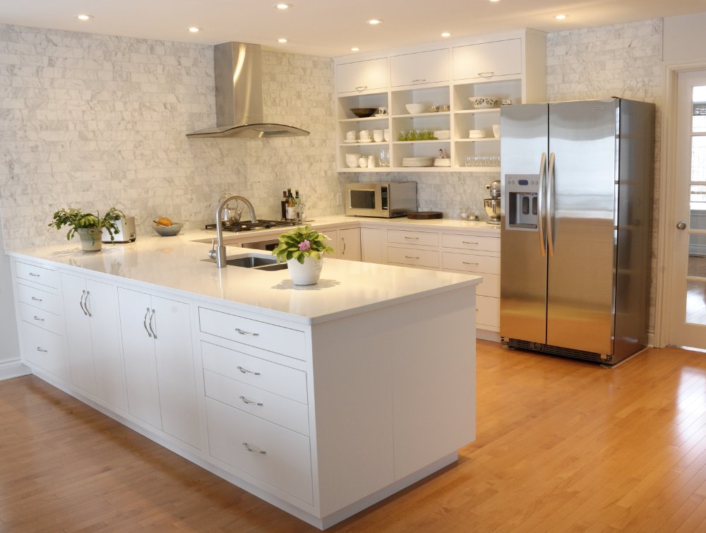 Contemporary White Kitchen: face frame construction, slab doors and drawer fronts, paint,  