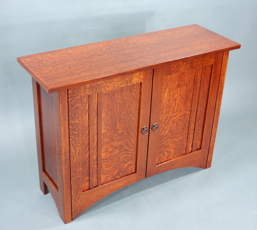 Arts & Crafts Cabinet: quarter sawn white oak; stained.